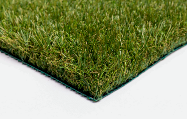 Close-up of artificial grass with a white background